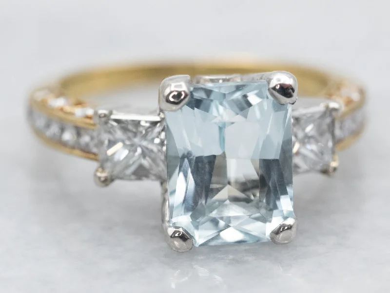 Vintage-inspired rings for women -Mixed Metal Yellow Gold and Platinum Blue Topaz Ring with Diamond Accents