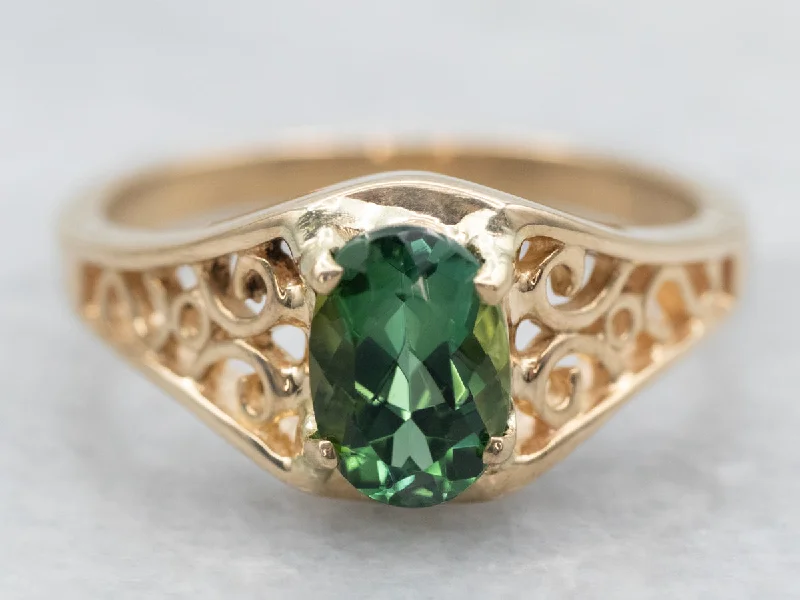 Vintage gold rings for women -Yellow Gold Oval Cut Green Tourmaline Solitaire Ring with Pierced Scrolling Shoulders