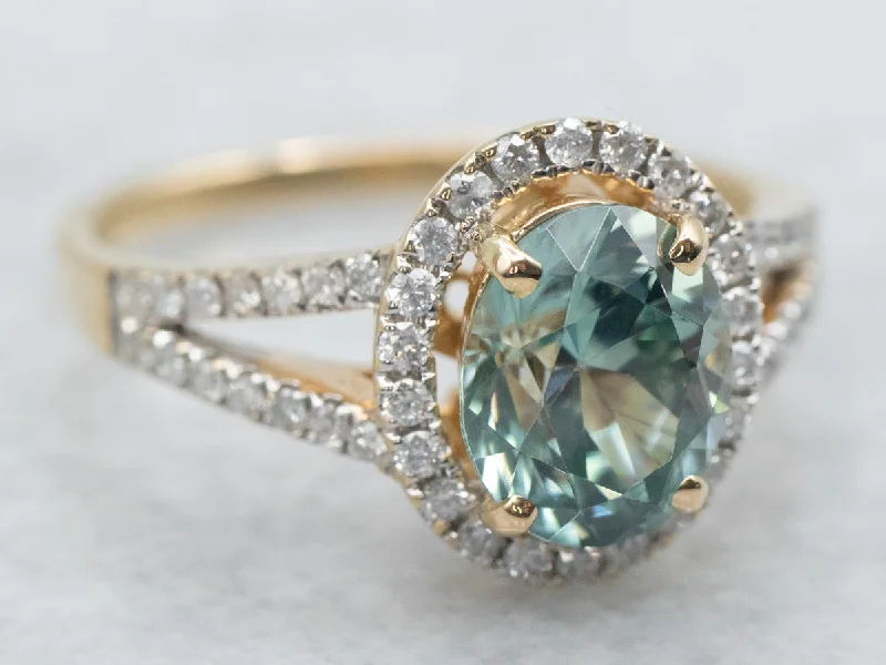 Elegant rings for women -Yellow Gold Oval Cut Blue Zircon Split Shank Ring With Diamond Halo and Diamond Shoulders