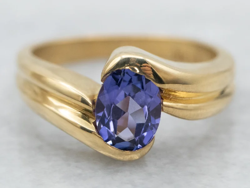 Elegant rings for women -Modern 18-Karat Gold Tanzanite Bypass Ring