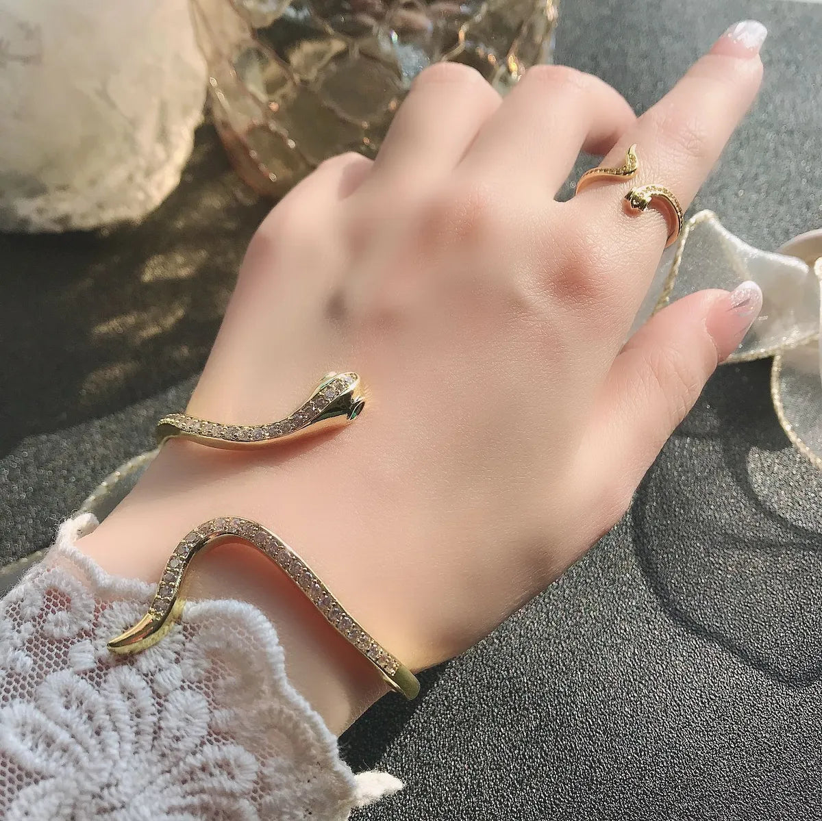 Luxury leather bracelets for women -Retro Snake Copper Gold Plated Inlay Zircon Women'S Rings Bracelets