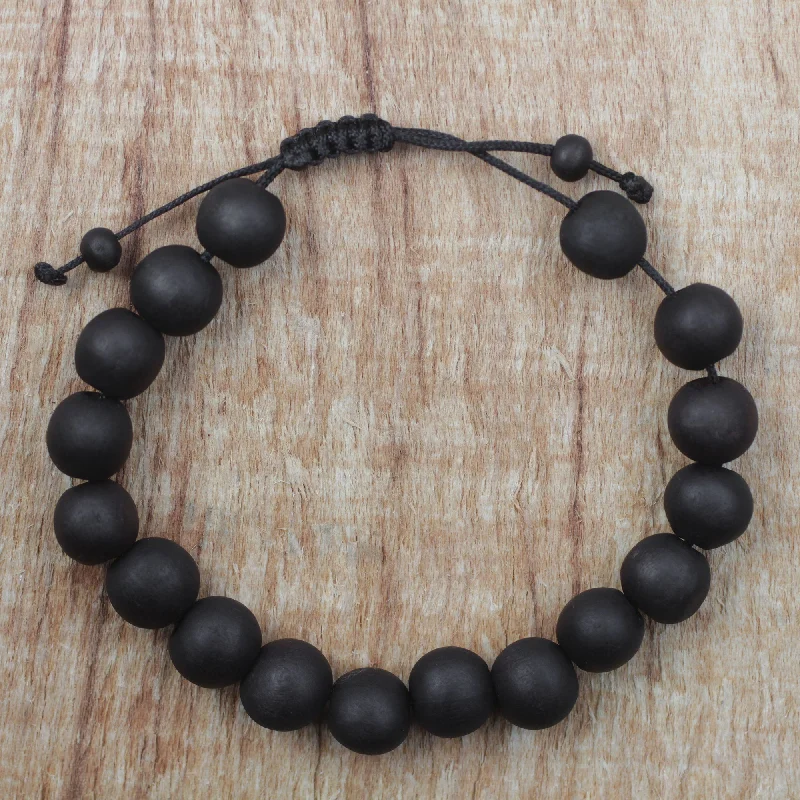 Wedding bangles for women -Chic Silhouettes Adjustable Ebony Wood Beaded Bracelet from Ghana