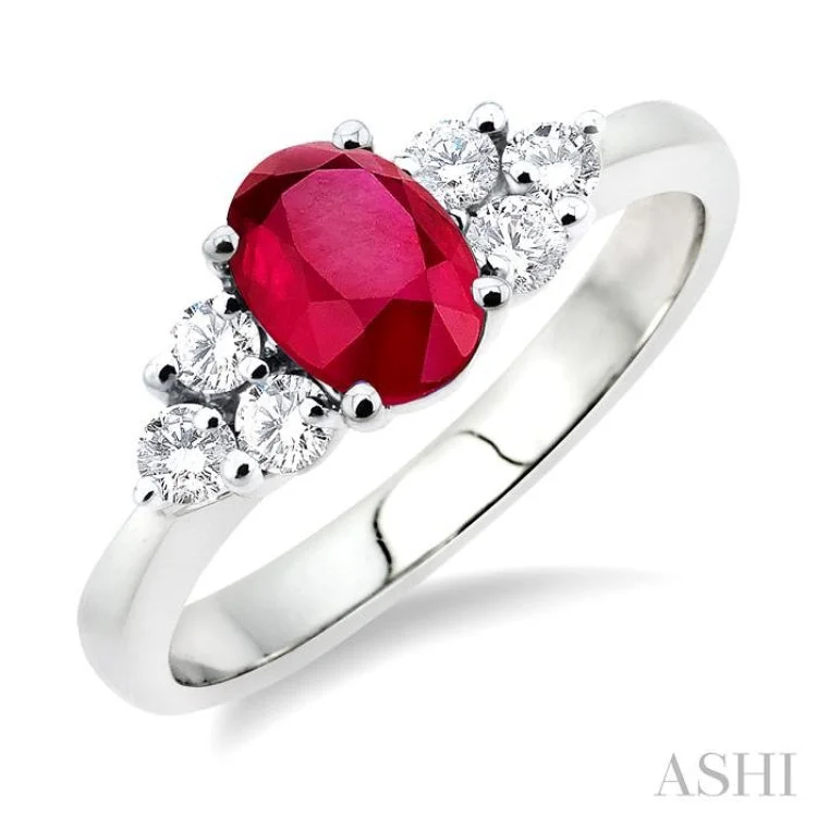 Heart-shaped engagement rings for women -7x5mm Oval Cut Ruby and 1/3 ctw Round Cut Diamond Ring in 14K White Gold