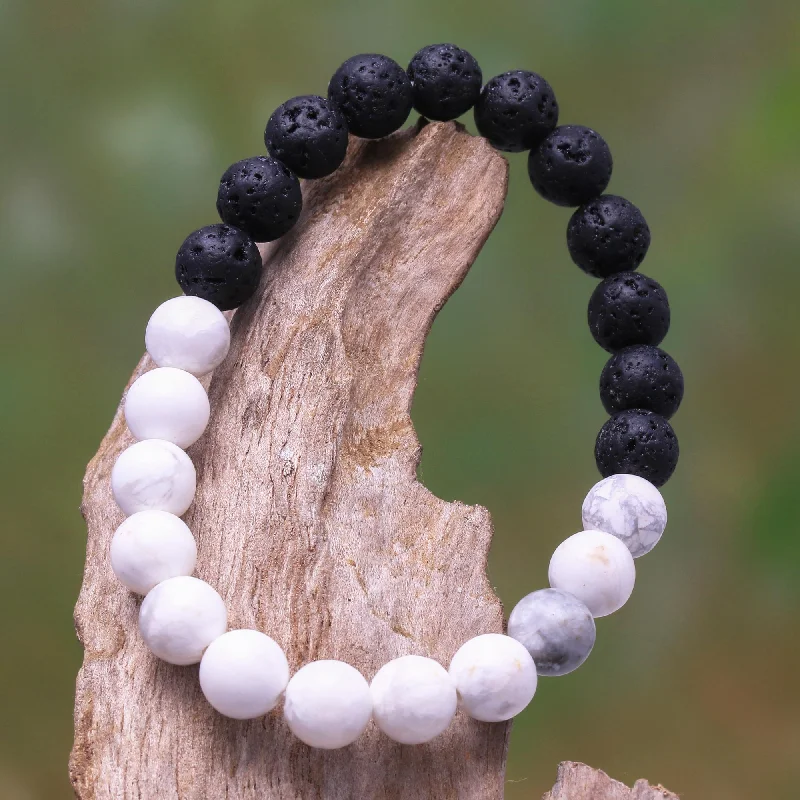 Tennis bracelets for women -Mesmerizing Contrast Ceramic and Lava Stone Beaded Stretch Bracelet from Bali