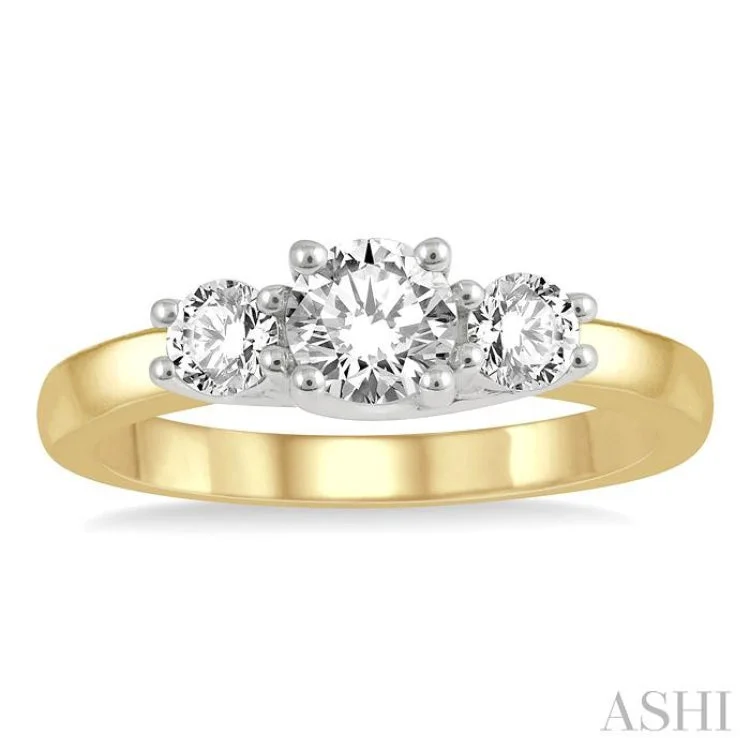 Engagement rings with sleek bands for women -3/4 Ctw Round Cut Diamond Three-Stone Ring in 14K Yellow and White Gold