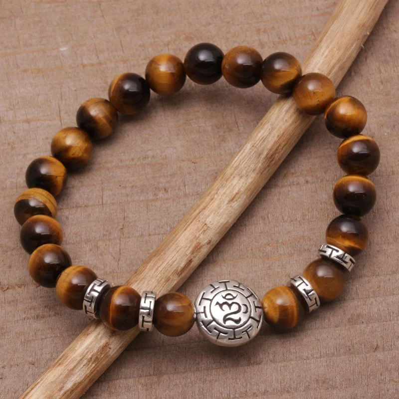 Classic cuff bracelets for women -Temesir Om Tiger's Eye Beaded Om Stretch Bracelet from Bali